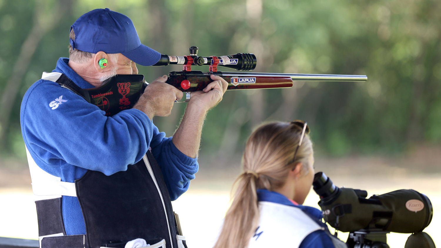 Modern-day smallbore rifle silhouette shooter and spotter