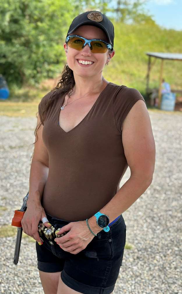 Beth Willoughby competes with a revolver and speed loaders at a Steel Challenge match