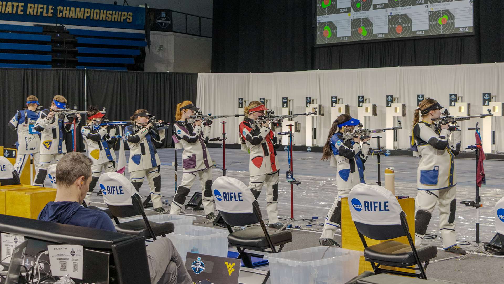 NCAA rifle competitors in standing position during smallbore three-position competition at the 2025 NCAA Rifle Championship
