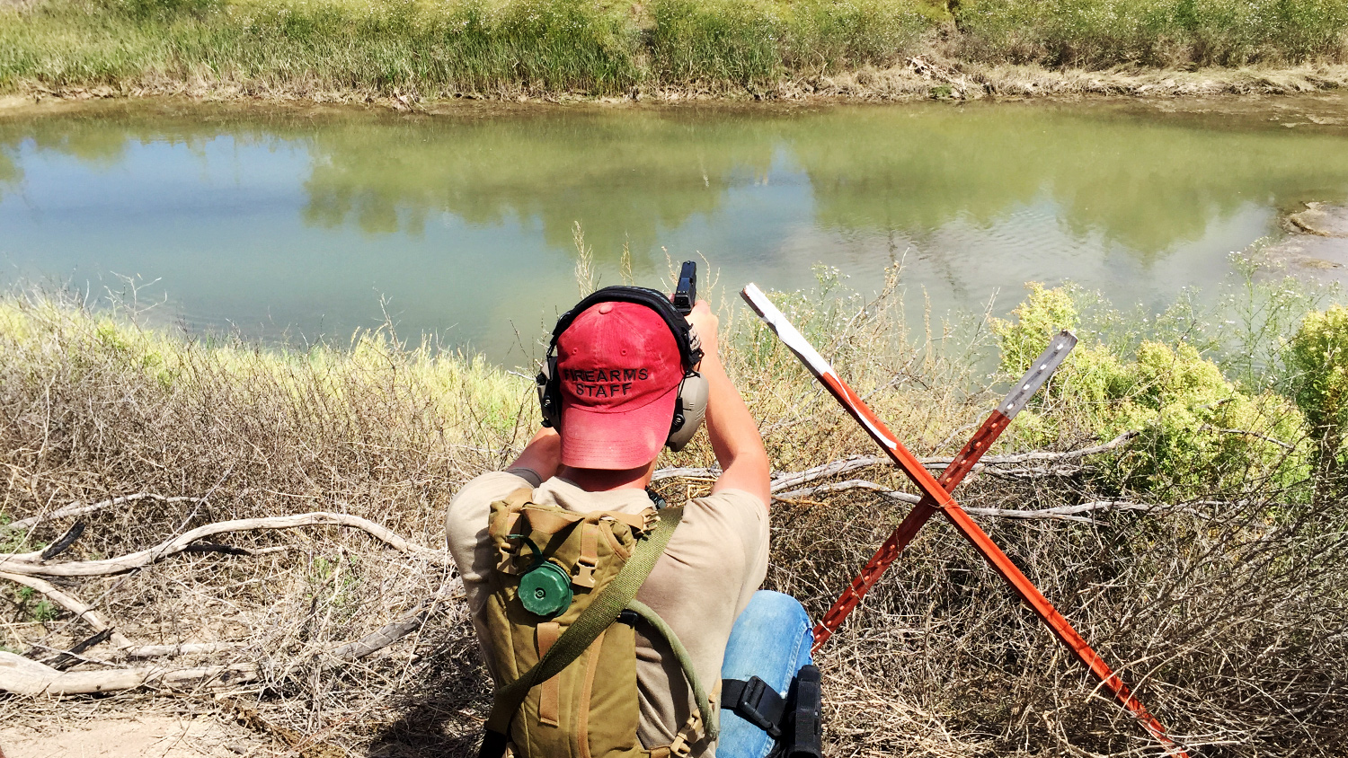 Pistol target shooting across Pecos River