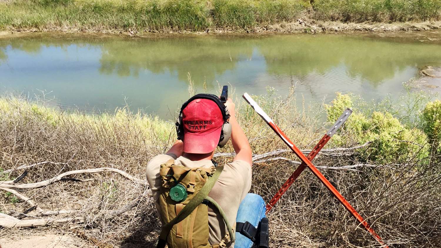 Pistol target shooting across Pecos River