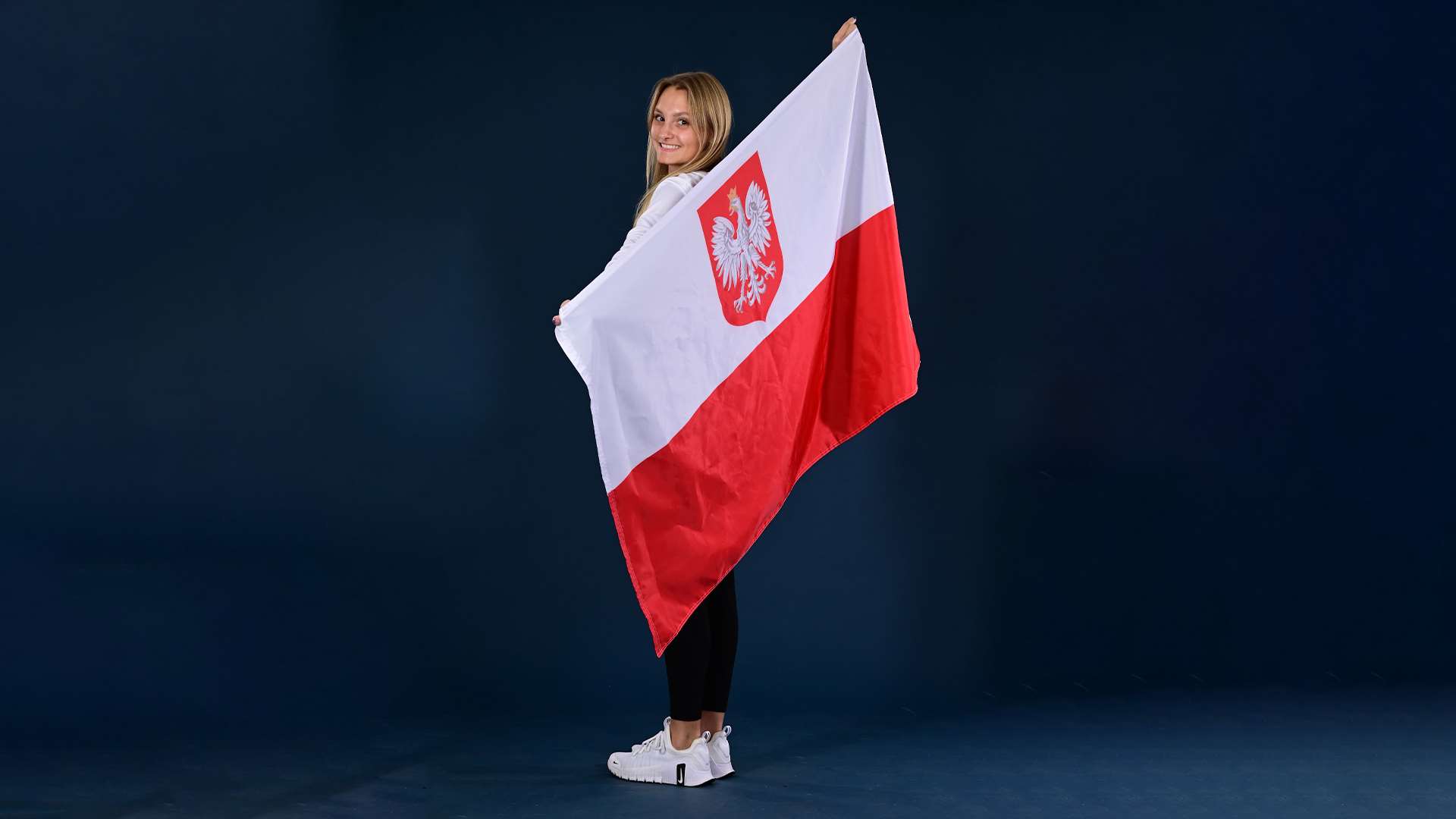 Natalia Siek with the Polish Flag