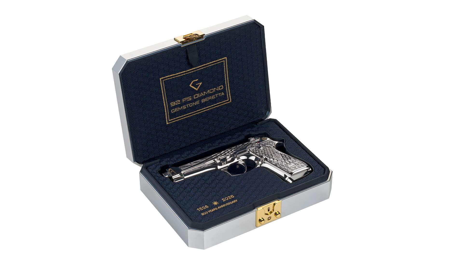 Beretta 92FS Diamond pistol resting in an open silver aluminum case with a navy fitted interior and gold anniversary lettering