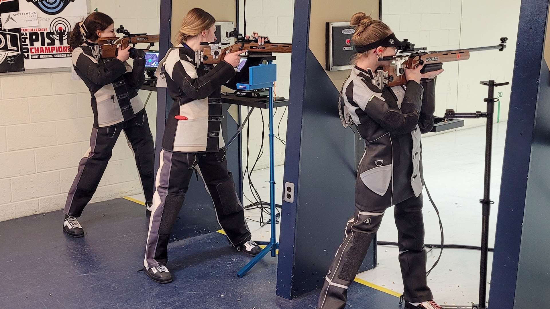 Mount Aloysius College Rifle Team on firing line in 2025 at the University of Akron in NCAA qualifier match
