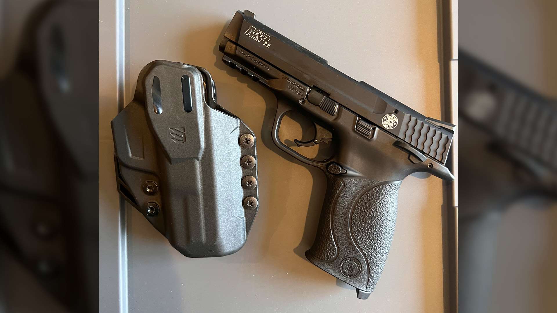 Stache IWB holster with rimfire pistol