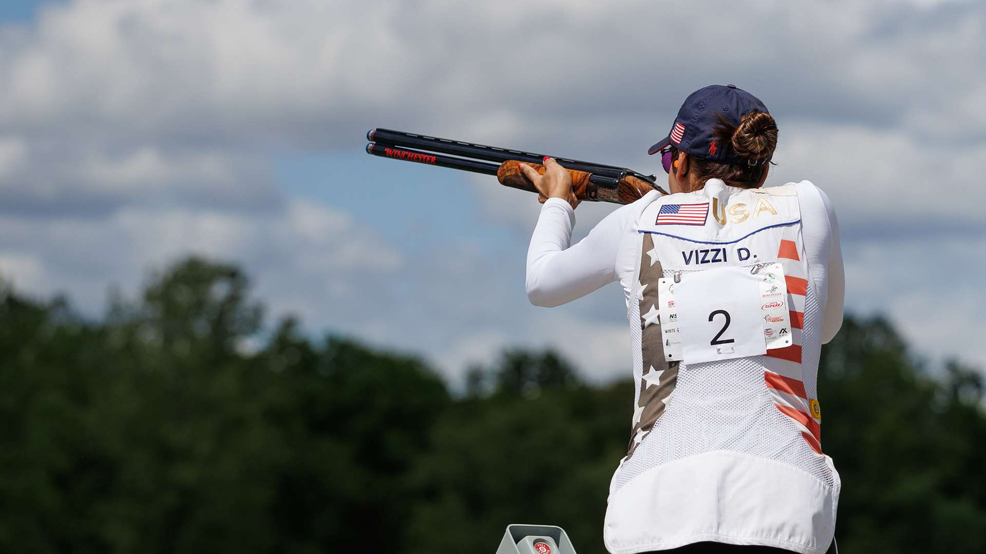 Vizzi shooting shotgun