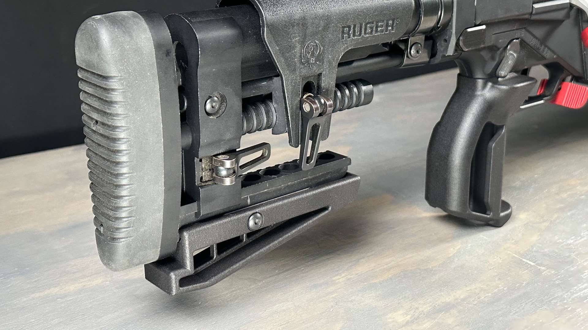 Ruger Precision Rifle buttstock and pistol grip on a bench with a Catalyst Arms Apex Bag Rider 2.0 installed
