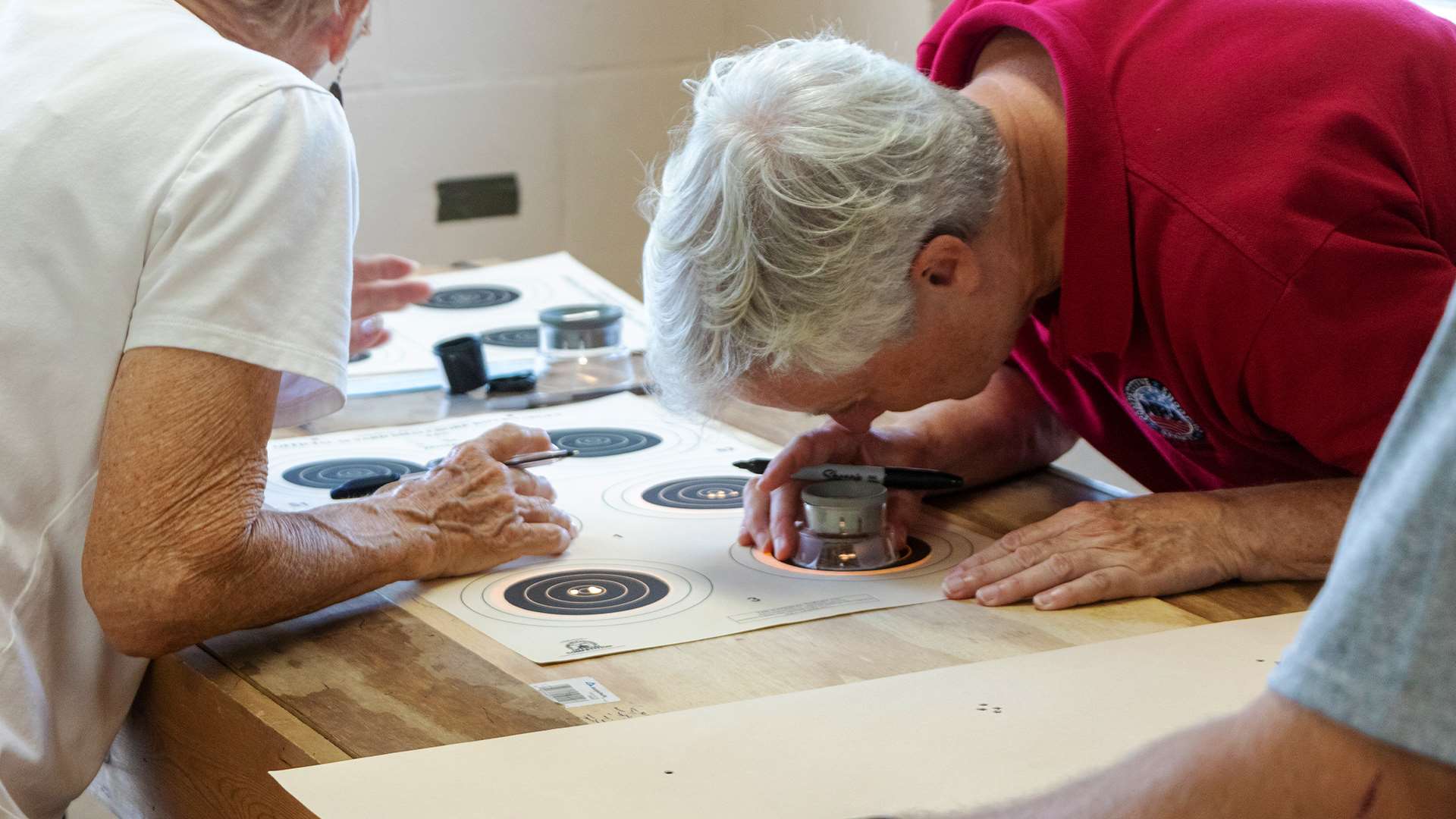 Edie Fleeman of NRA scoring targets