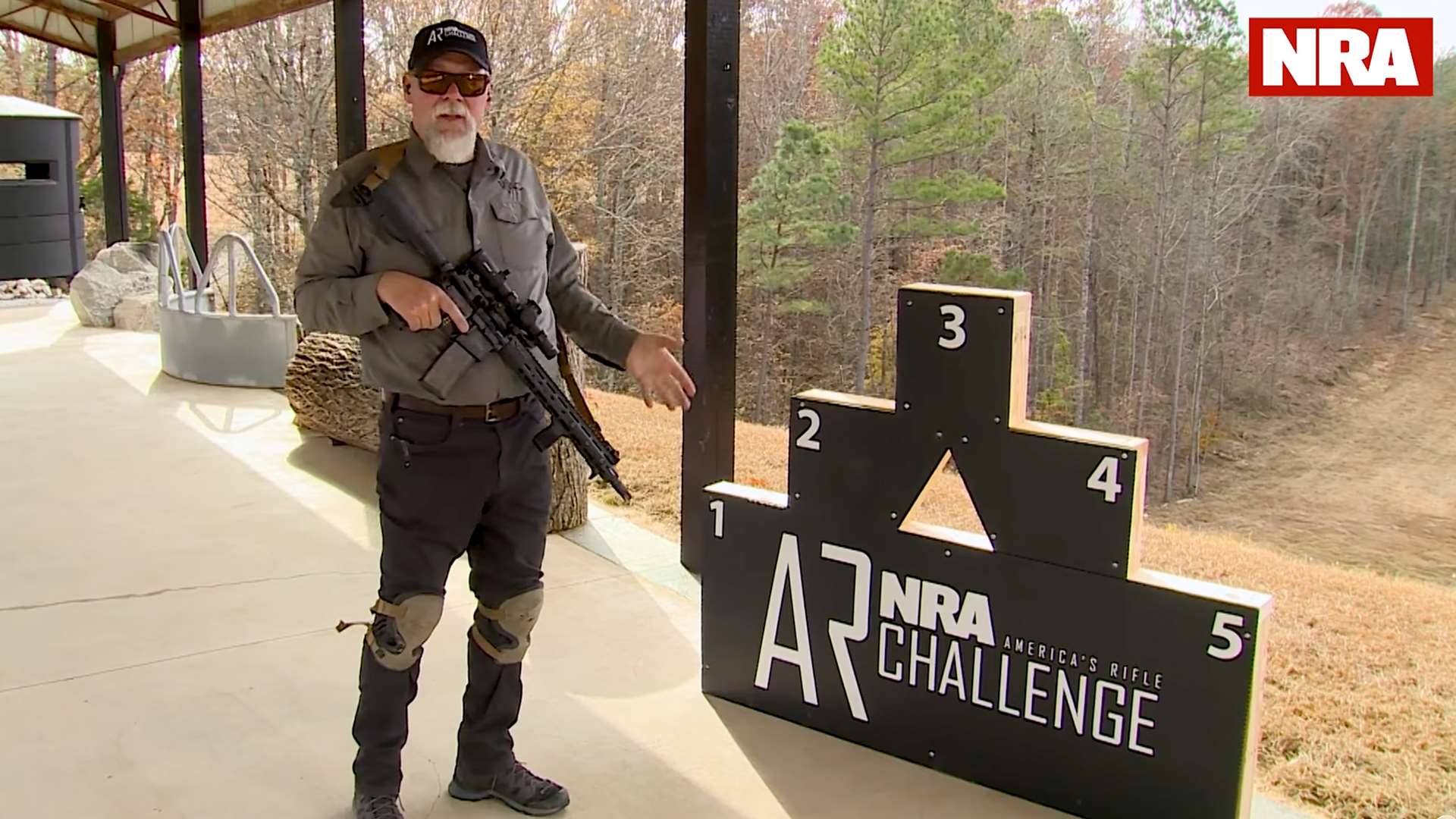 Kyle Lamb of Viking Tactics shooting from the NRA America’s Rifle Challenge barricade during instructional video on barricade tips and technique