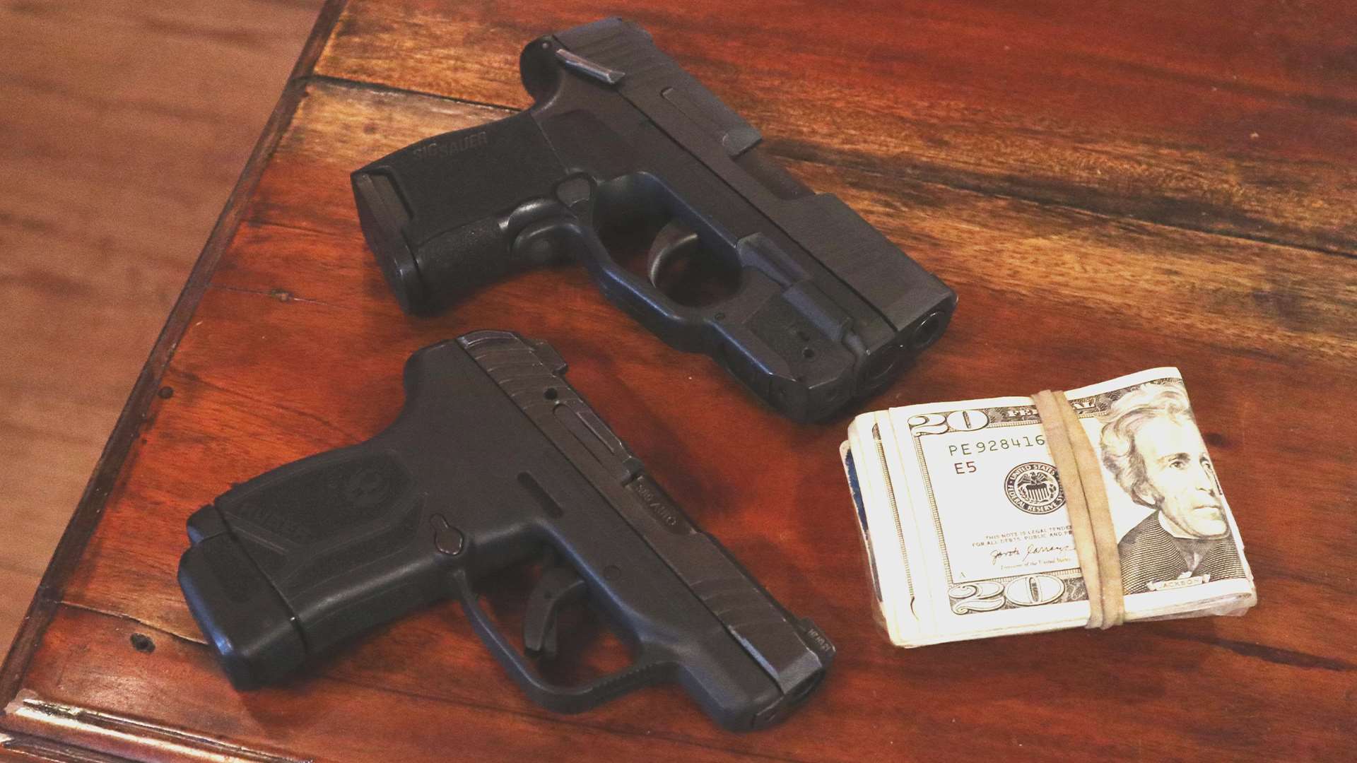 Ruger LCP MAX and wad of bills