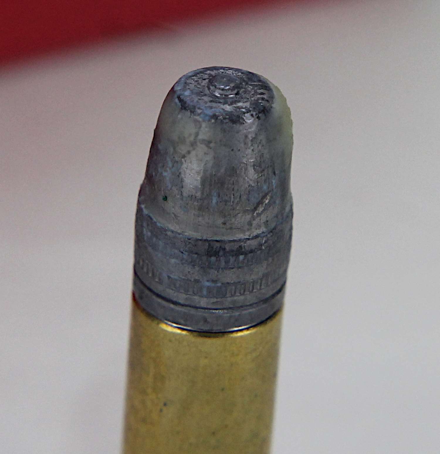 Flat nose bullet with nipple