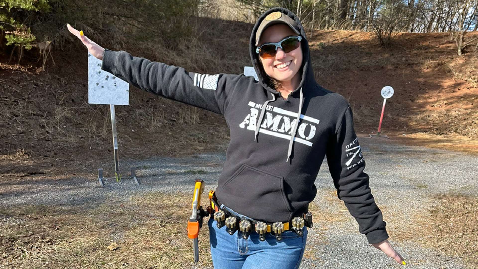 Beth Willoughby smiling on the range at a Steel Challenge match