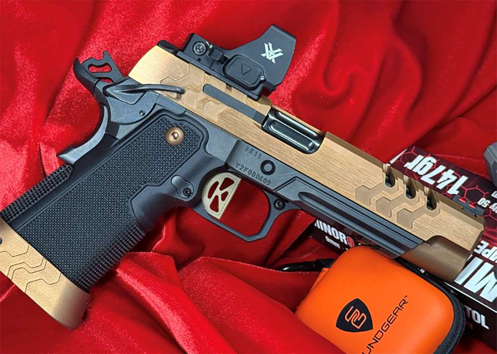 Close-up of the Kimber 2K11 Target (OR) 9 mm double-stack 1911 showing extended controls, custom slide serrations and accessory rail