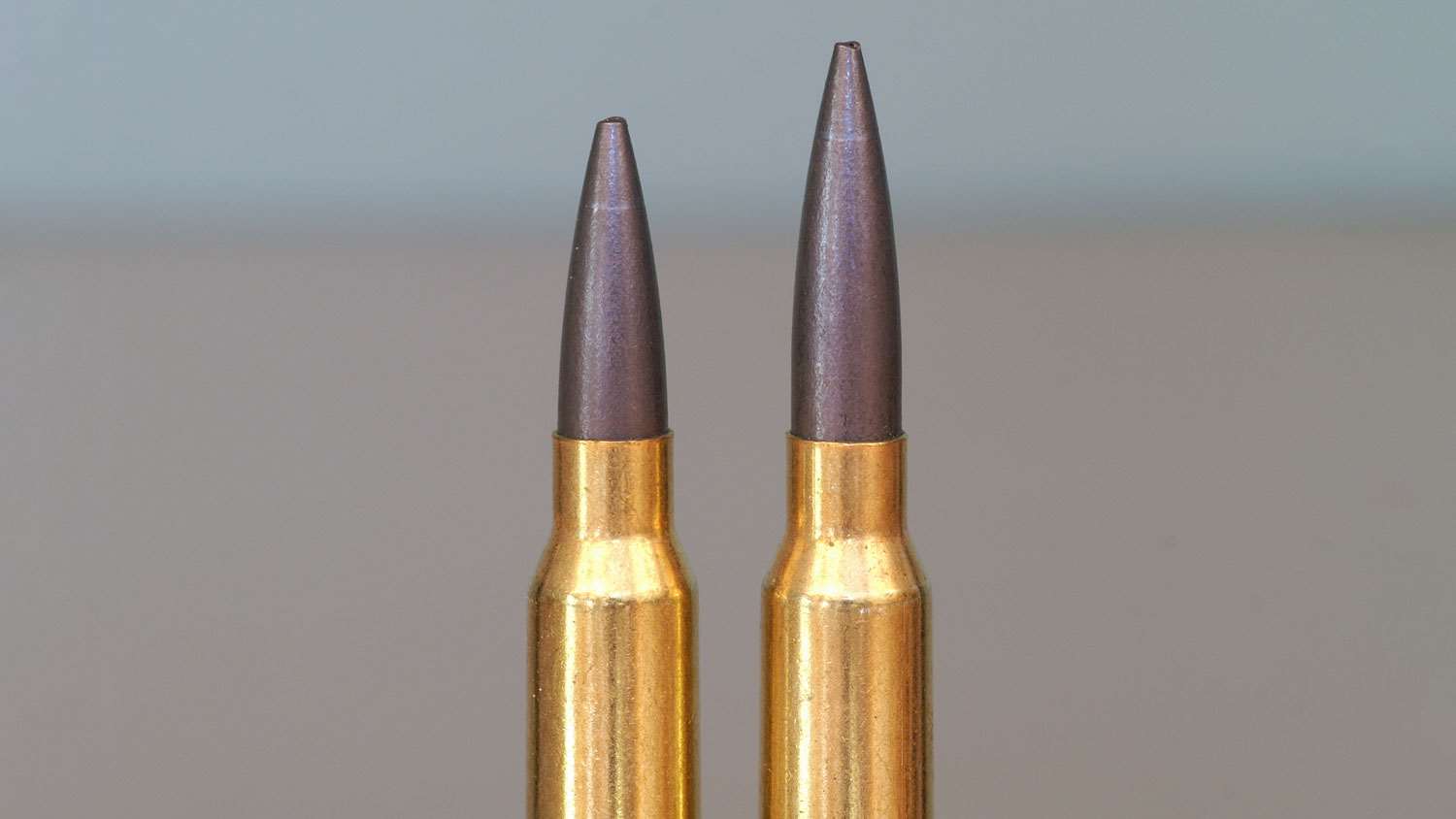 This is the effect of leade length and angle. These two cartridges contain a Sierra 80-grain MatchKing seated to touch the lands. Left: SAAMI, right: NATO. There’s a whopping 0.150-inch difference. (Glen Zediker)