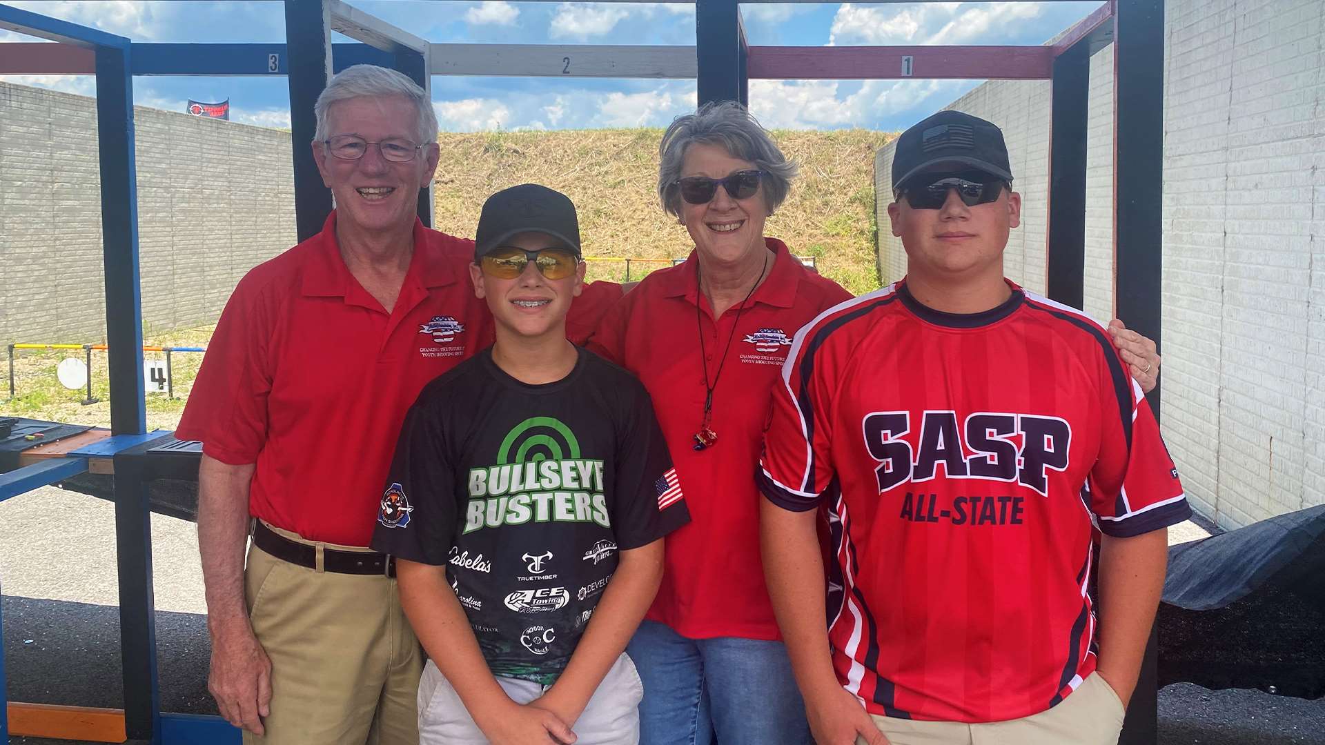 Larry & Brenda Potterfield with youth shooters