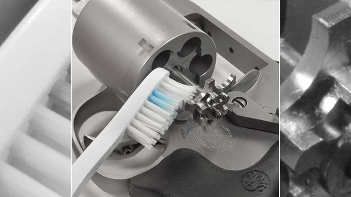 Toothbrush to clean under revolver extractor star