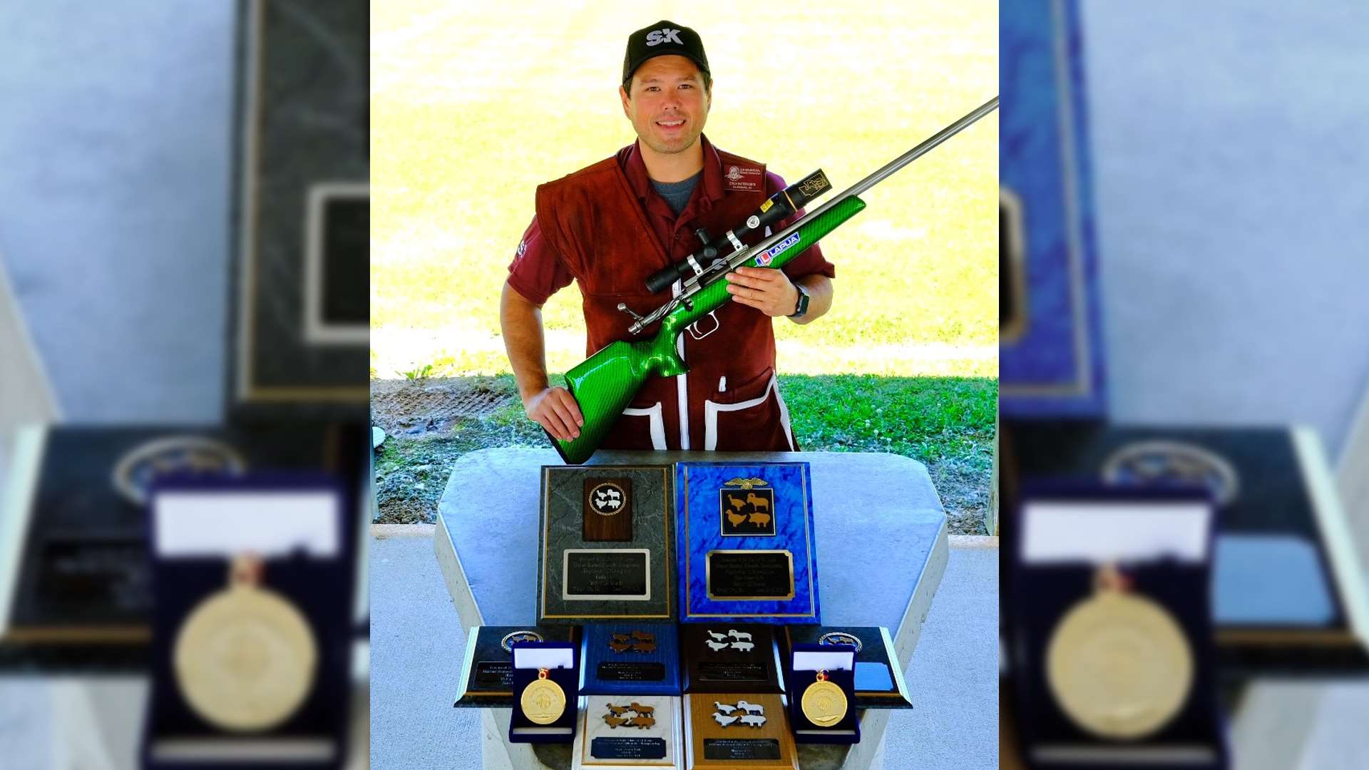 Erich Mietenkorte with rifle and match awards