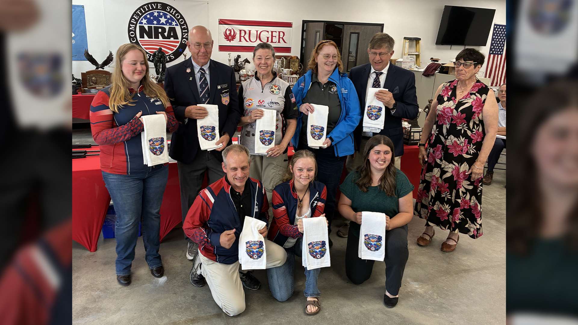 2026 NRA Three-Position Hands Across the Sea teams receive plaques at awards ceremony with Mike O'Connor and Patti Clark