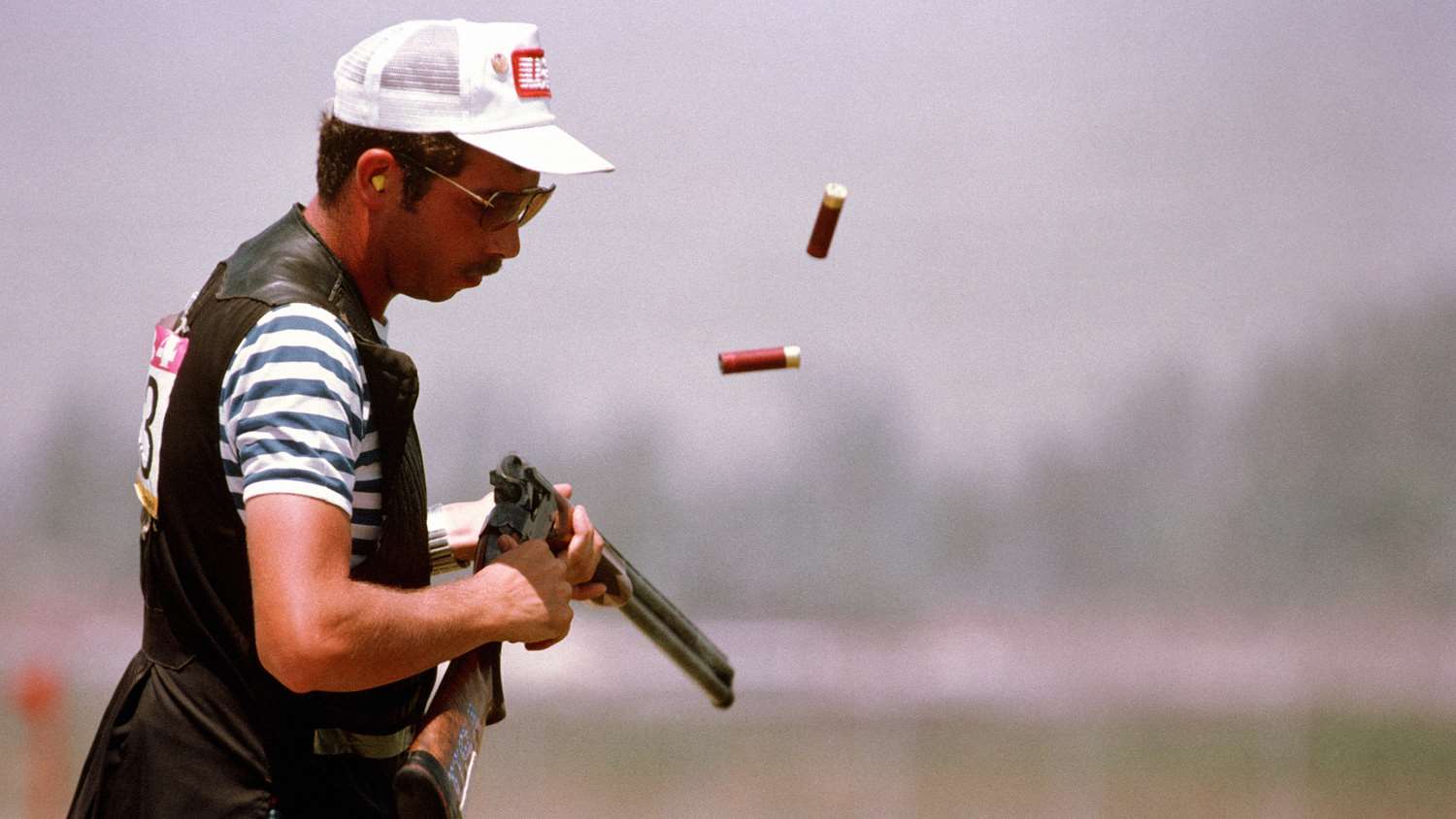Matthew Dryke competes in the skeet shooting event at the 1984 Summer Olympics