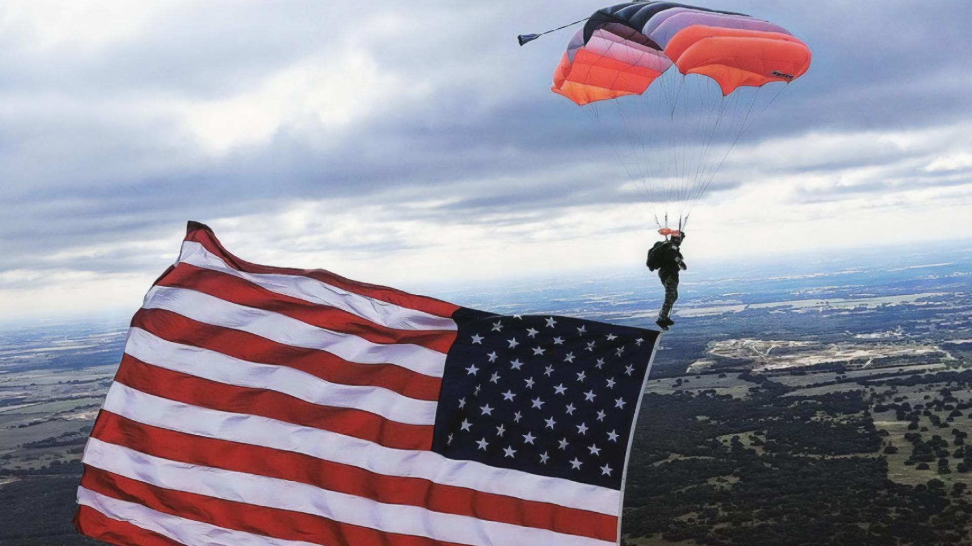 Parachutist and American flag