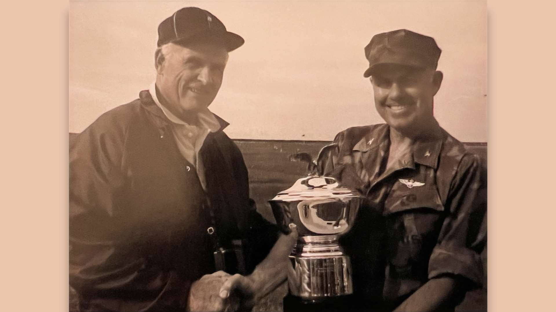 Irvine C. Porter presents namesake trophy to Col. Kenneth Erdman