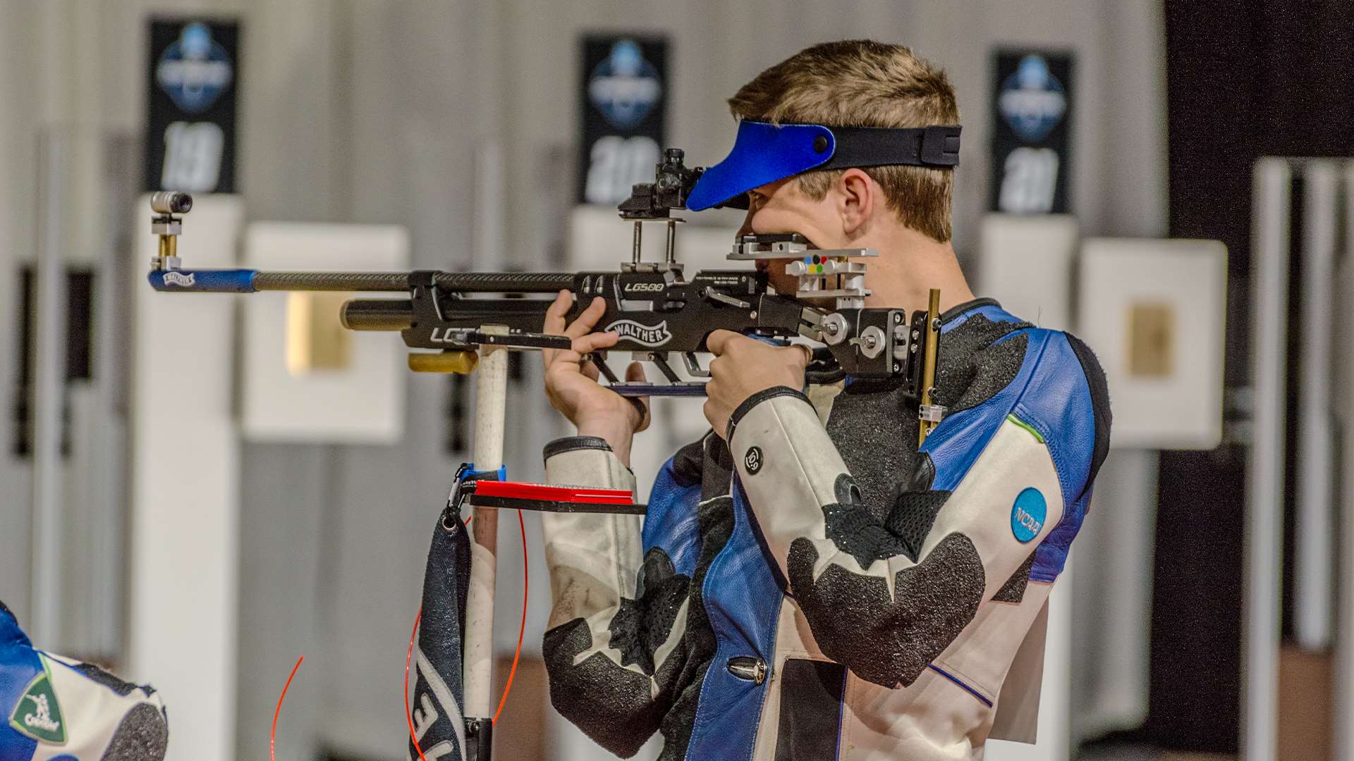 Braden Peiser competing with his Walther air rifle at the 2026 NCAA Rifle Championship