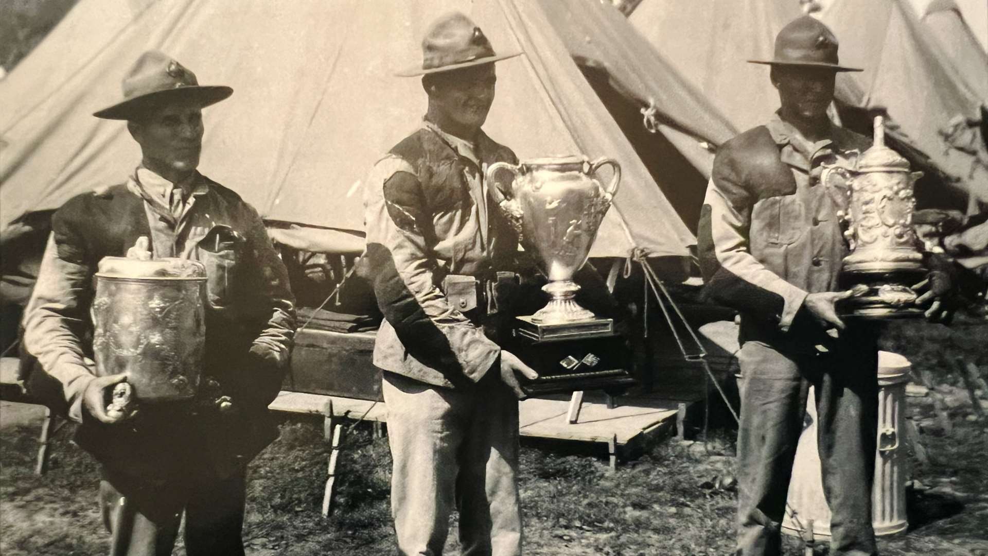 Marines at the 1927 National Matches with NRA trophies after individual victories
