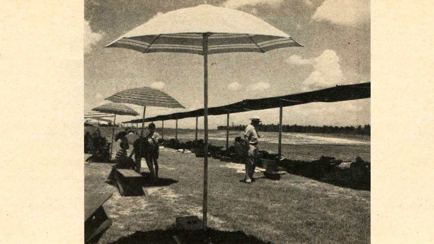 The original caption to this photo from the October 1952 issue of American Rifleman: &quot;Brightly colored sun umbrellas behind the smallbore firing line gave Jacksonville National added gayety.&quot;