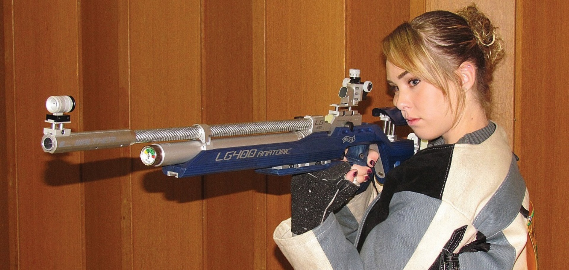Jenna Fees aiming rifle