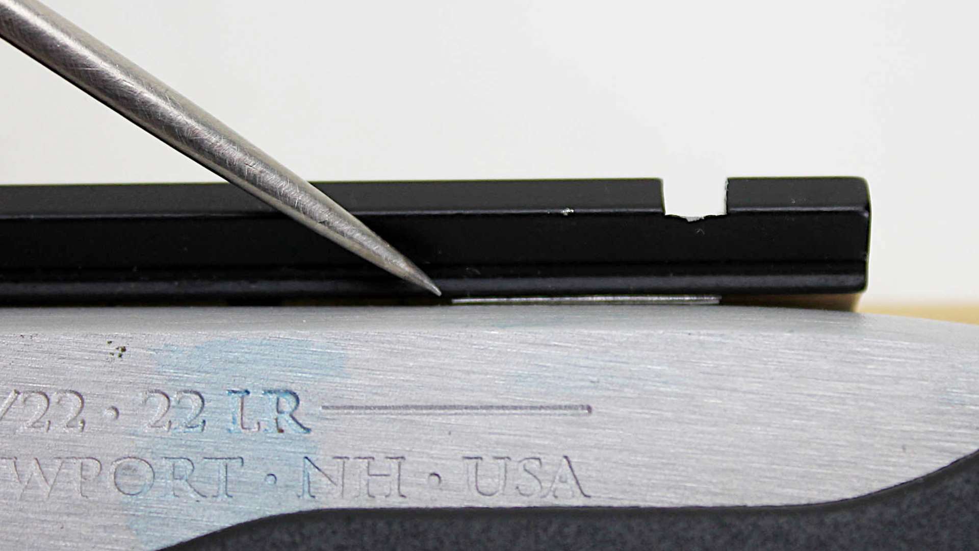 A shim placed under a Ruger 10/22 scope mount