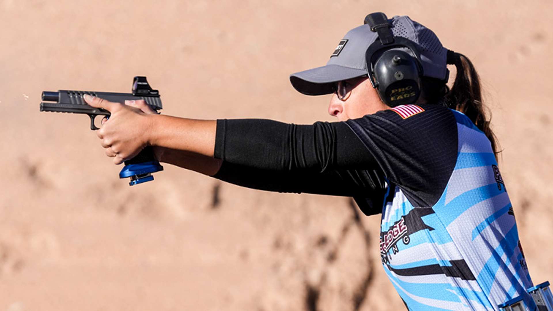 Mikayla Hill fires a pistol during a stage at the 2025 USPSA Vortex Optics Race Gun Nationals in Hurricane, Utah