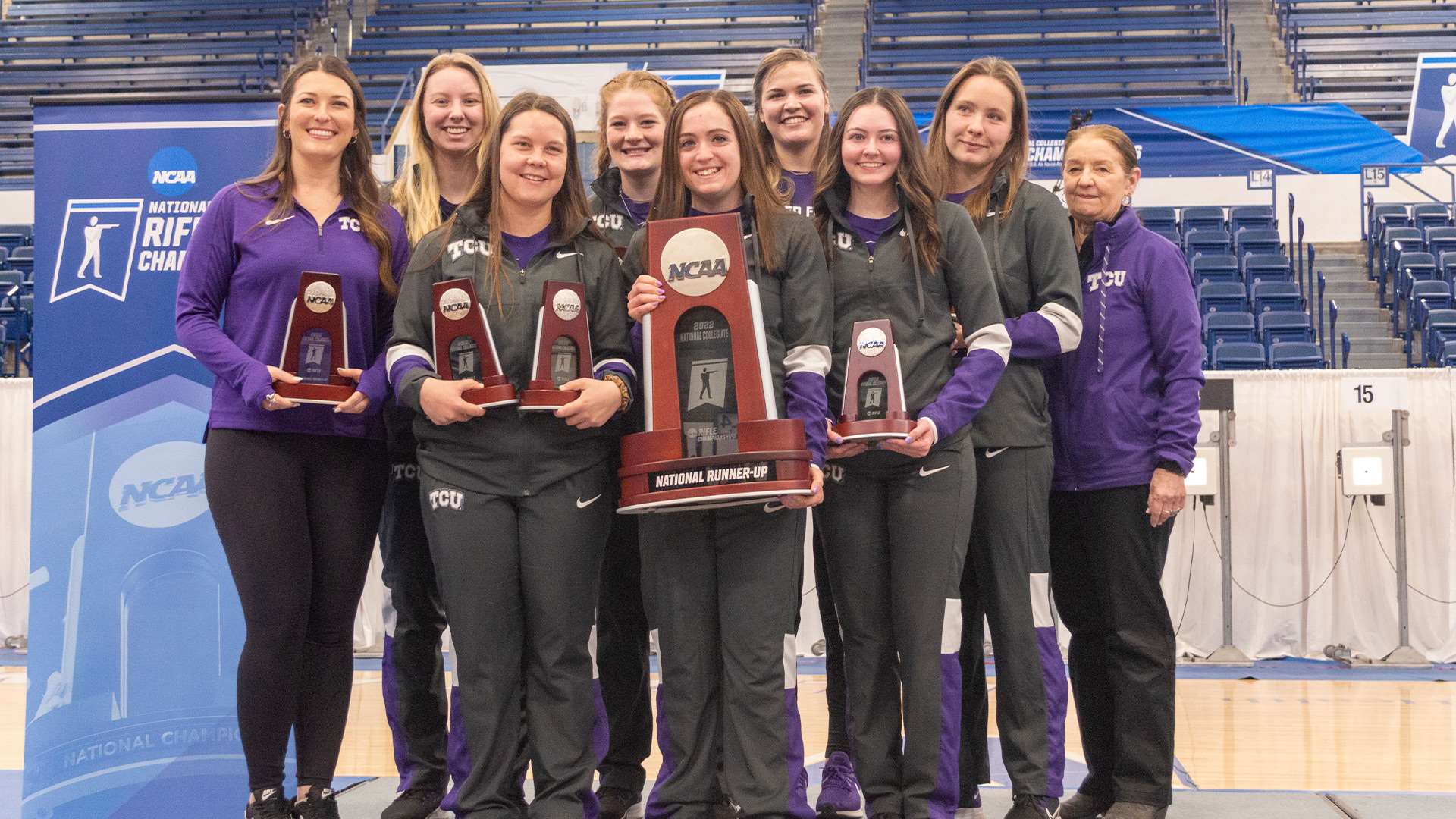 TCU rifle team with trophies