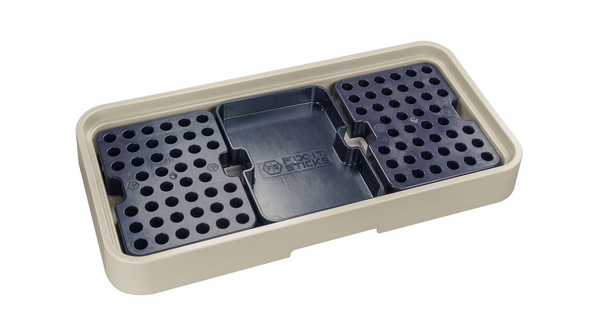 Fix It Sticks Tray Organizer in tan and dark blue ABS polymer photographed against a white background, showing two perforated bit trays flanking an open rectangular parts tray