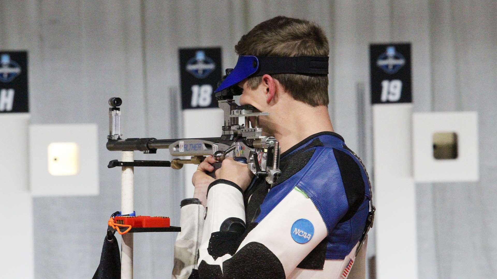 Braden Peiser competing in the 2026 NCAA rifle championship smallbore final at Ohio State's Covelli Center