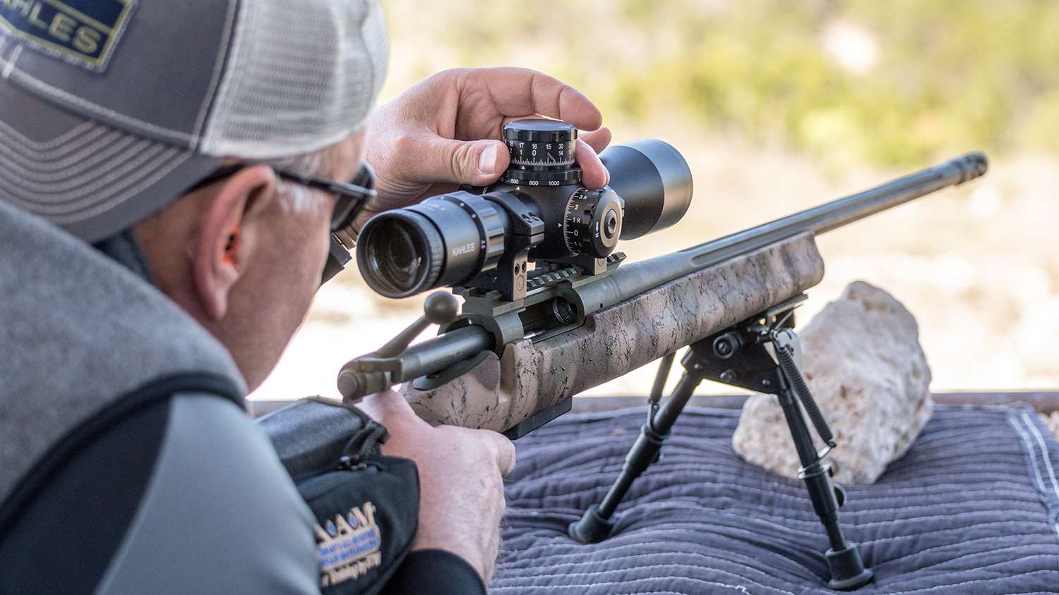 Tom Hogan of Swarovski adjusting elevation for an 850-yard shot