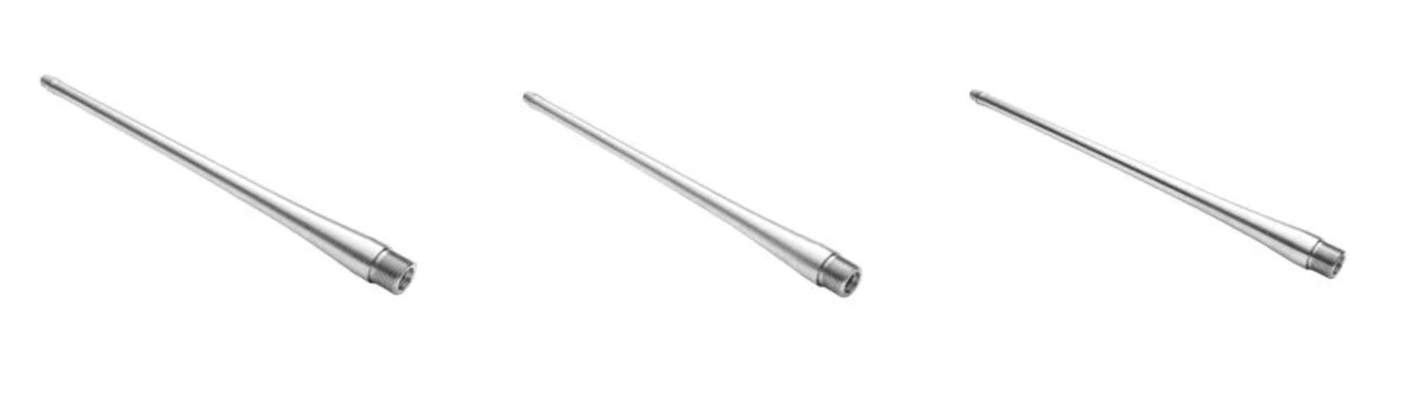 Three Wilson Combat satin stainless steel replacement barrels for Remington 700 pattern actions side by side on a white background
