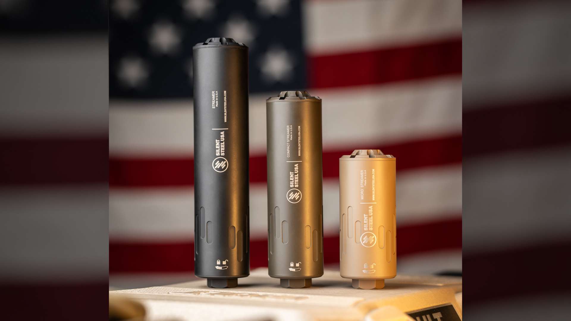 Silent Steel USA Streamer suppressor family on a patriotic background