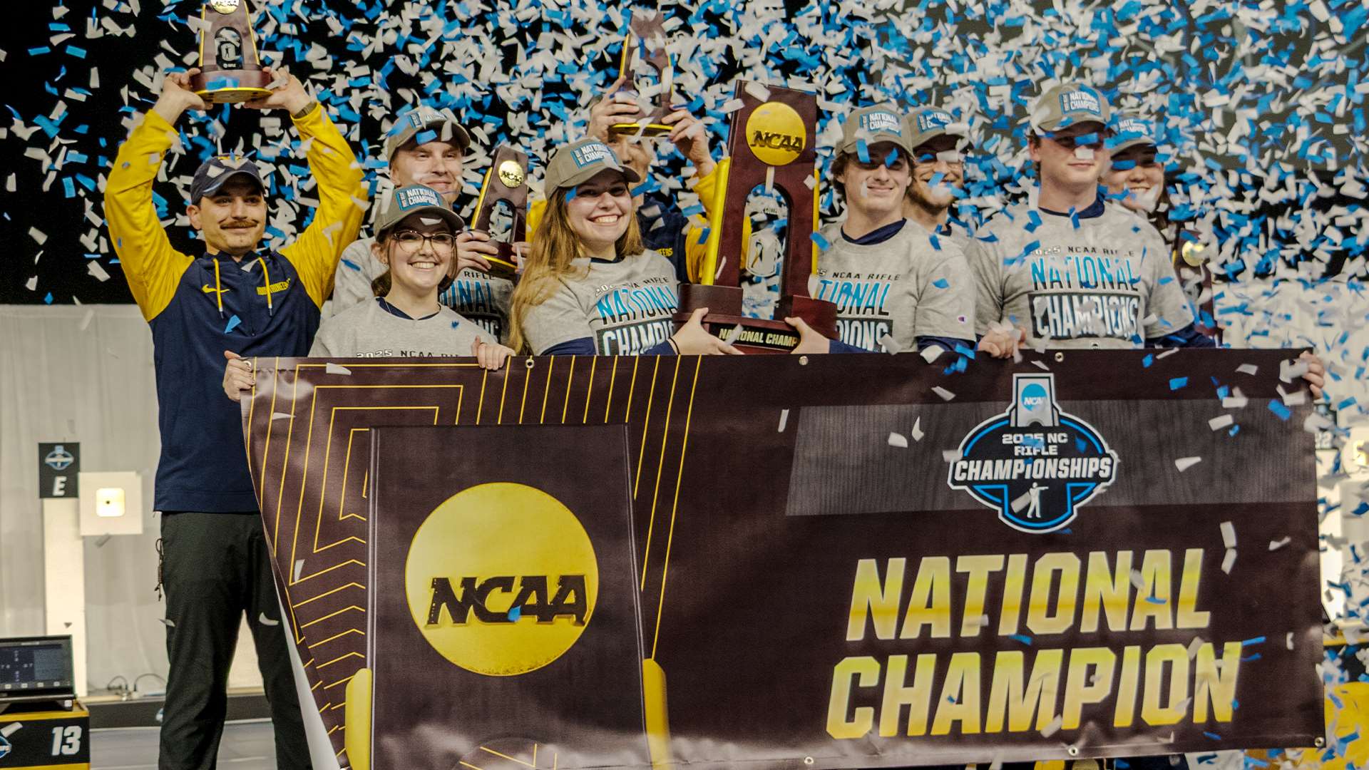 West Virginia Mountaineers celebrate winning the 2025 NCAA Rifle Championship at Memorial Coliseum in Lexington Kentucky