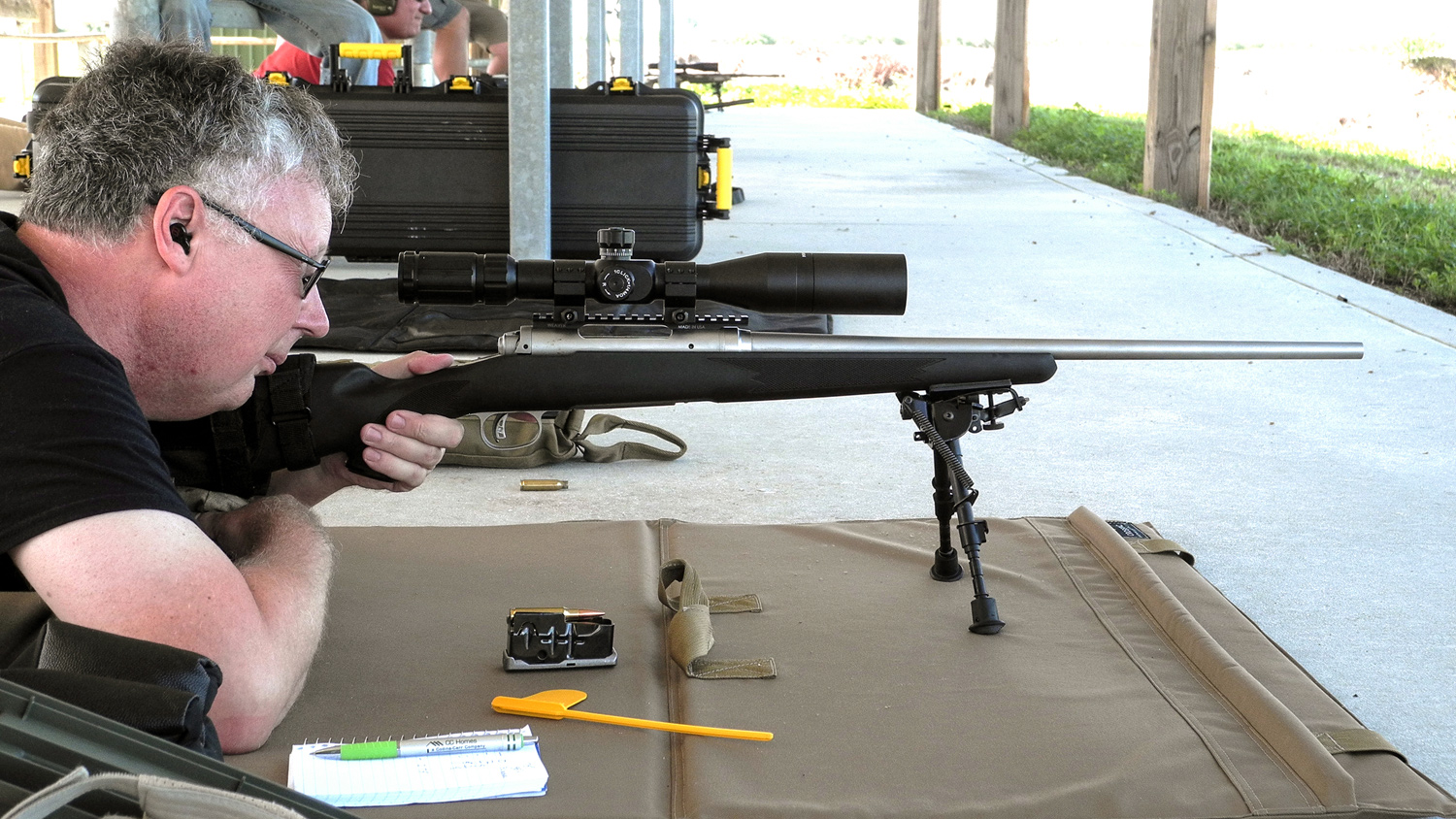 Savage 116 Storm rifle in  .308 Win., topped with a Primary Arms 4-14x44 mm optic.