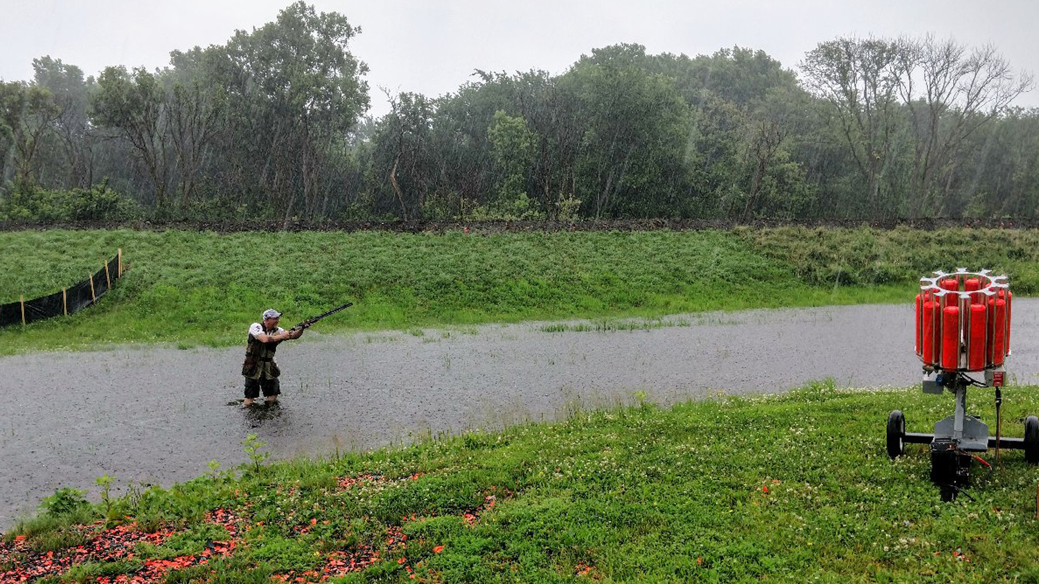 Dave Miller shooting during a rainstorm