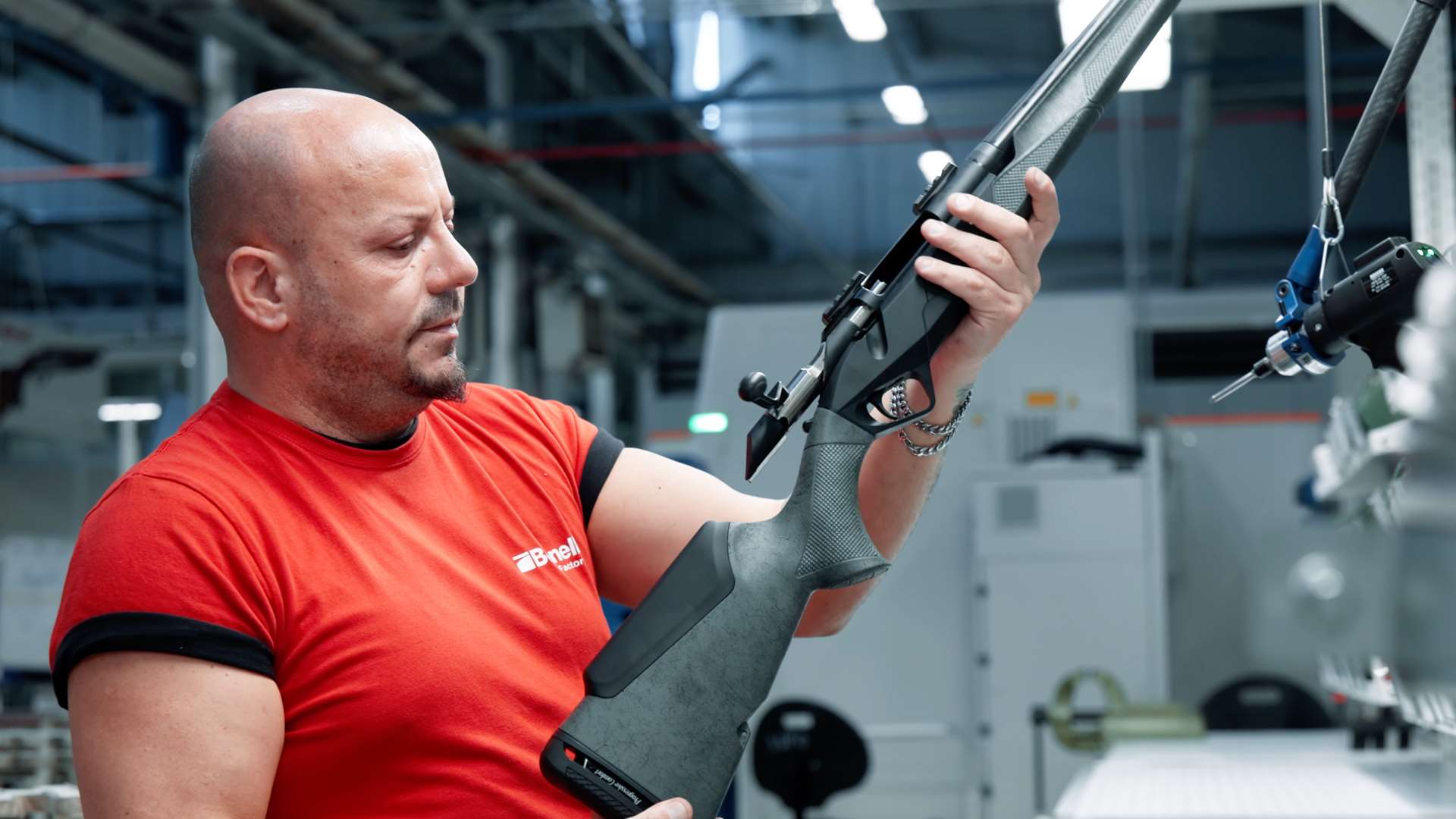 Benelli Lupo rifle undergoing a final check by a worker at the company’s factory in Italy