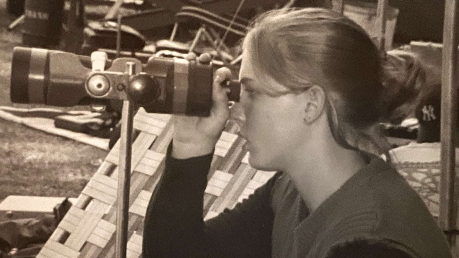 Kristi Crenwelge with a spotting scope on a Camp Perry Range in 1999