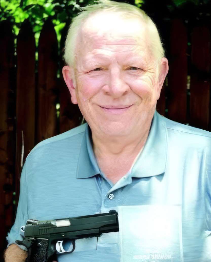 Gary "Mr. Overlay" Stevens holding a handgun in an undated photo