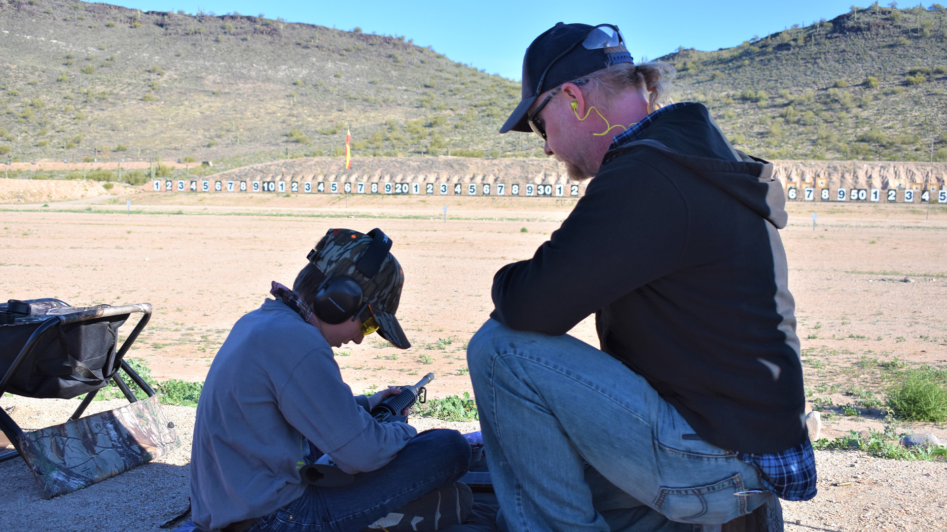 Sterling Martin receiving high power rifle instruction