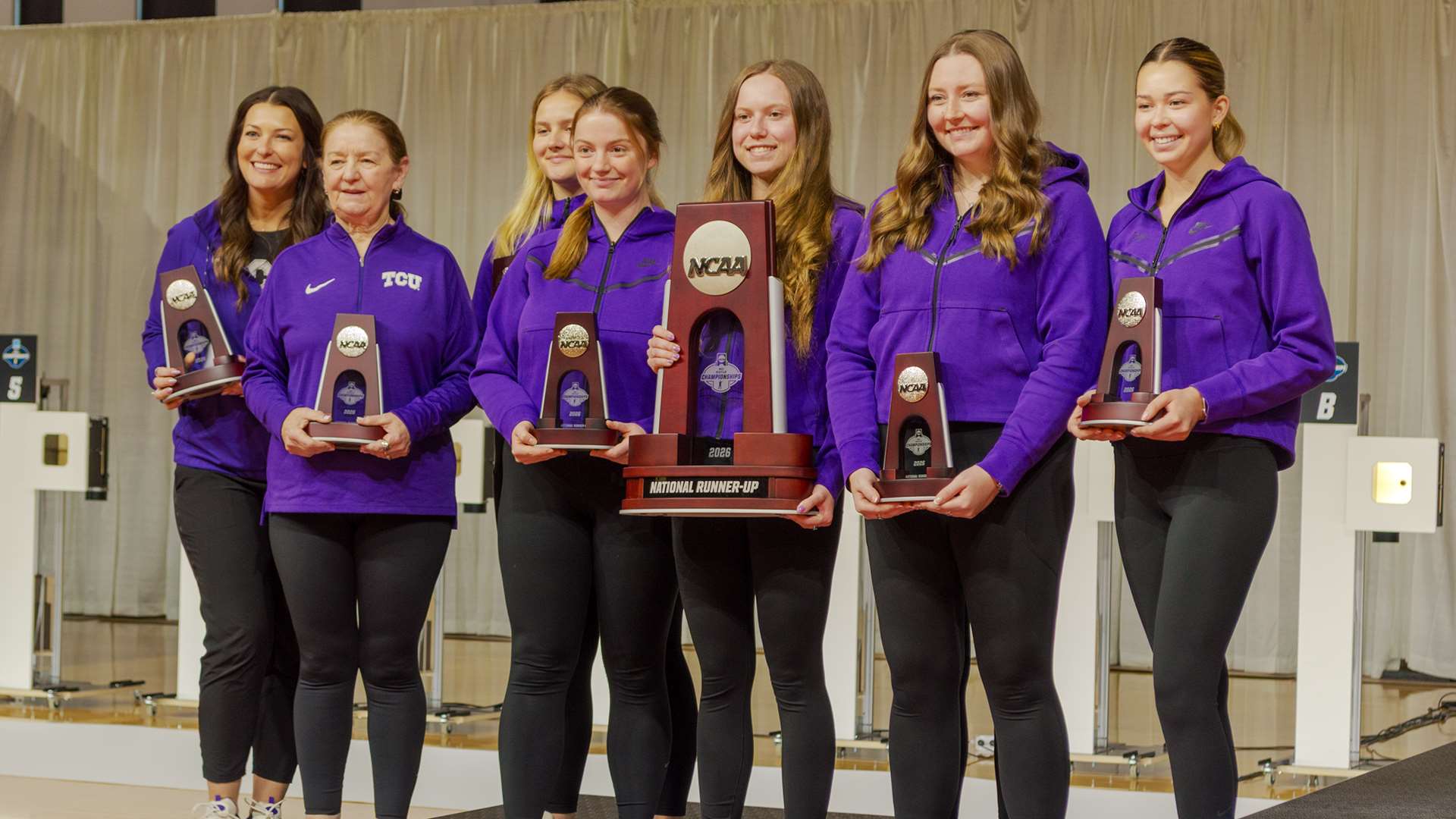 TCU rifle team on podium at 2026 NCAA Rifle Championship