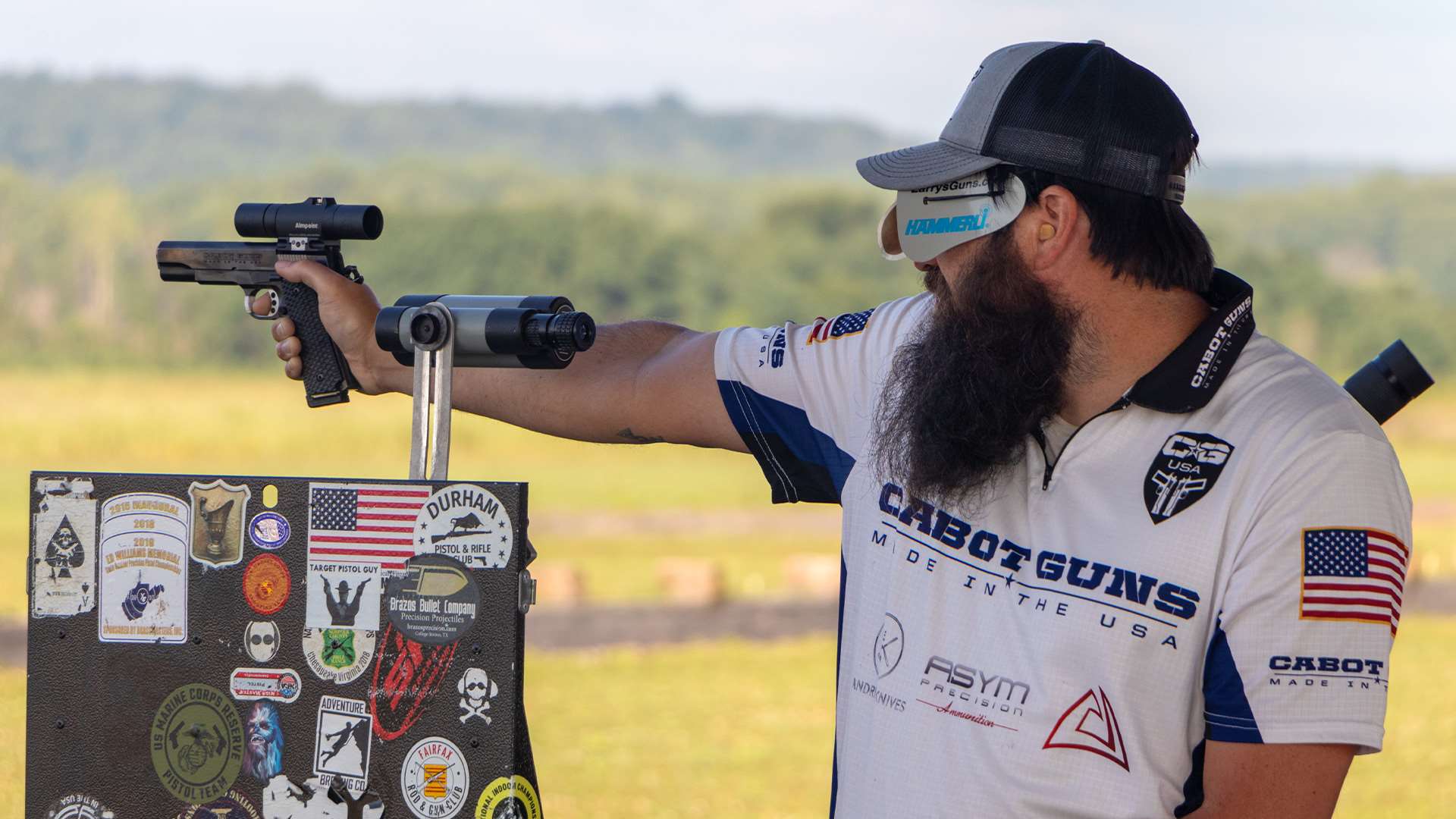 Jon Shue shooting a pistol