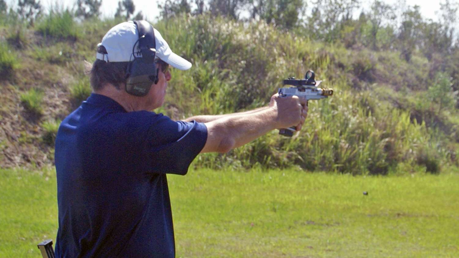 John Reilly shooting the STI DVC Steel 9 mm