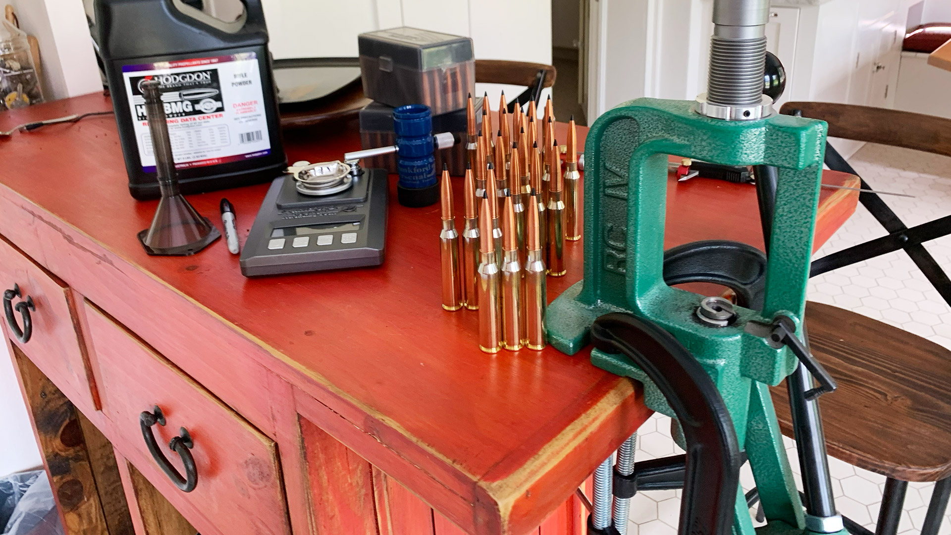 Reloading station with C-clamps