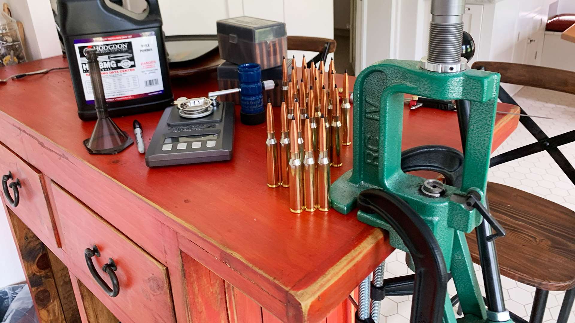 Reloading station with C-clamps