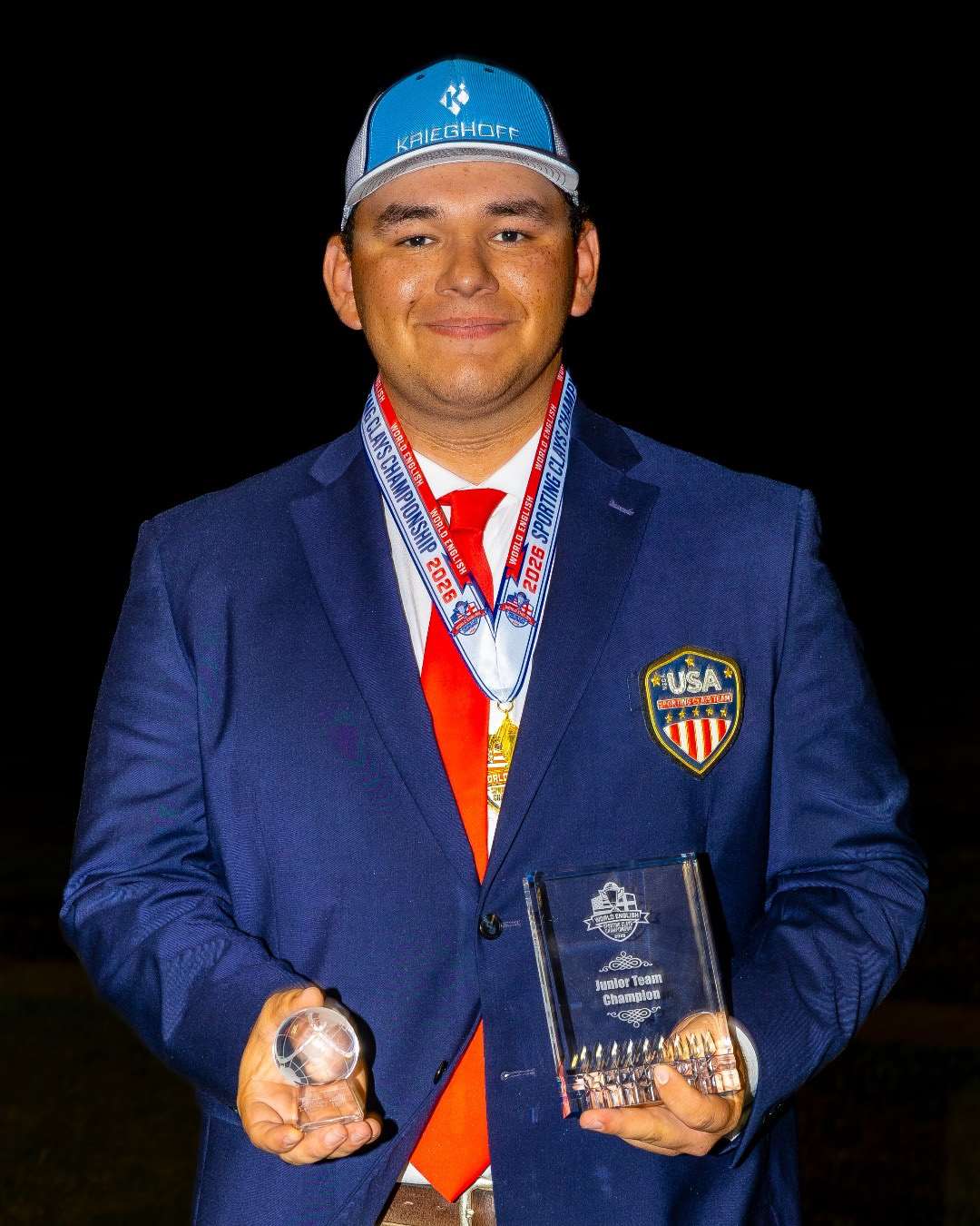 Jonathan Prince holds the U.S. Junior Team National Teams trophy after the 2026 World English Sporting Clays Championship in San Antonio, Texas